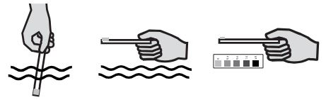 How to check water parameters in an aquarium using Test Strips Dip into the water - black and white
